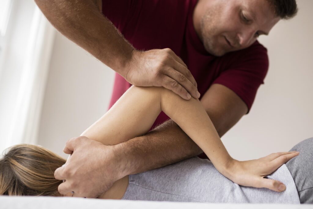 osteopathy-patoient-getting-tretment-massage - Hope Wellness