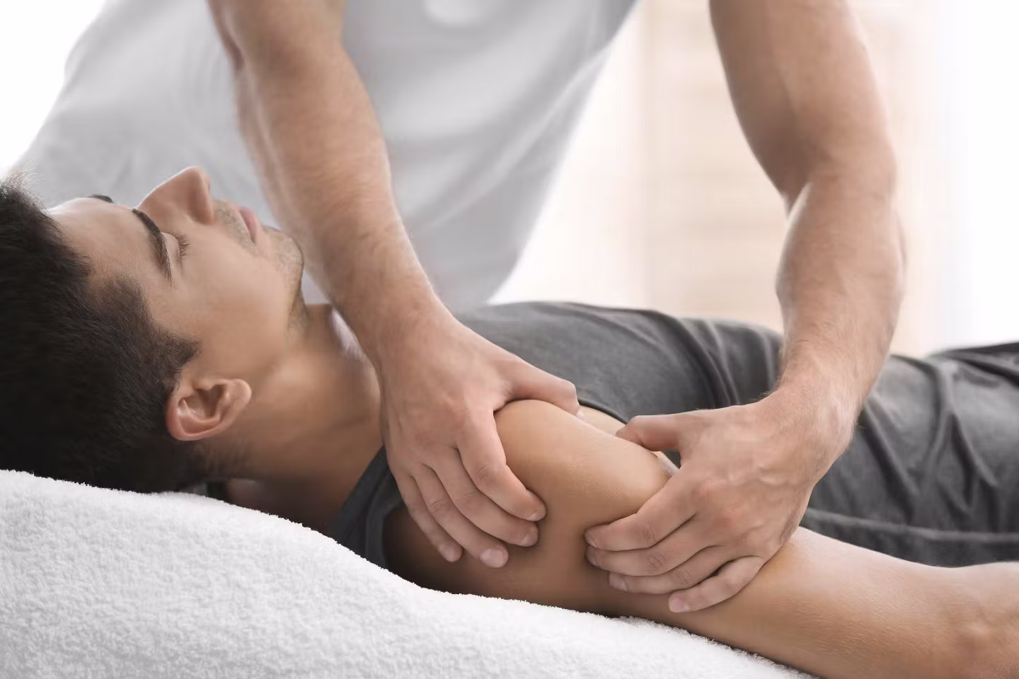 Client receiving relaxation massage therapy in Milton at a wellness clinic