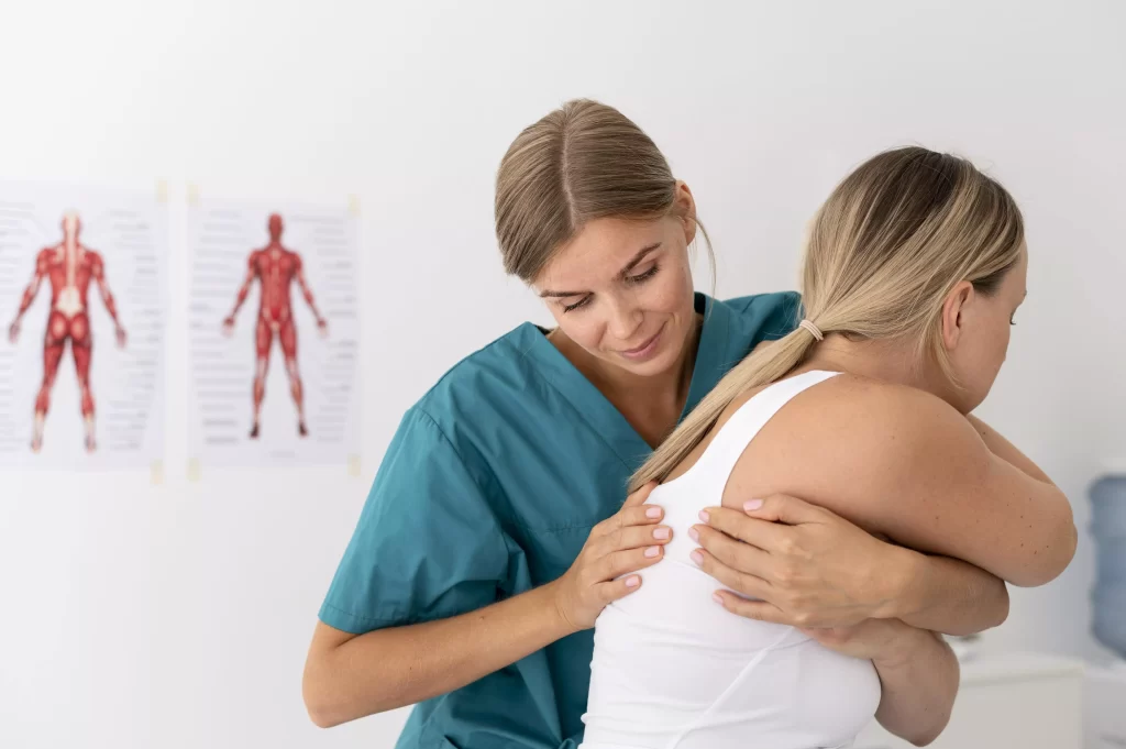 Registered massage therapist performing therapeutic massage to relieve muscle tension in Milton.