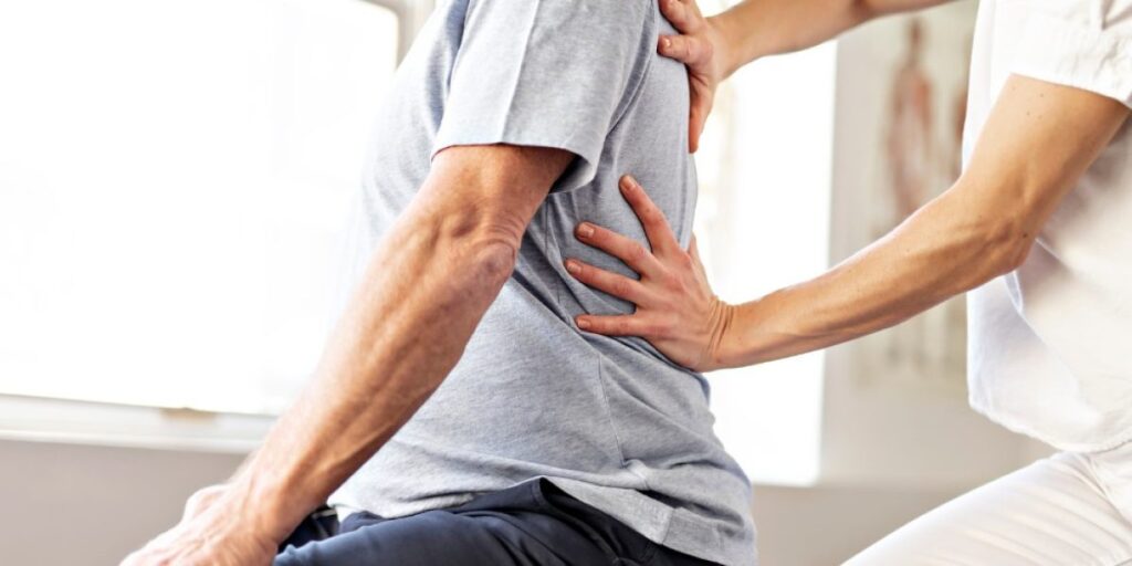 Patient receiving physiotherapy treatment during a rehabilitation session related to concussion physiotherapy in Milton.
