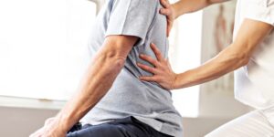Patient receiving physiotherapy treatment during a rehabilitation session related to concussion physiotherapy in Milton.